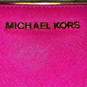 Hot pink Michael kors wallet with flaws